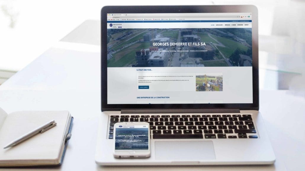 Mockup du site web de Demierre SA sur ordinateur et smartphone – réalisé par Swiss Creative